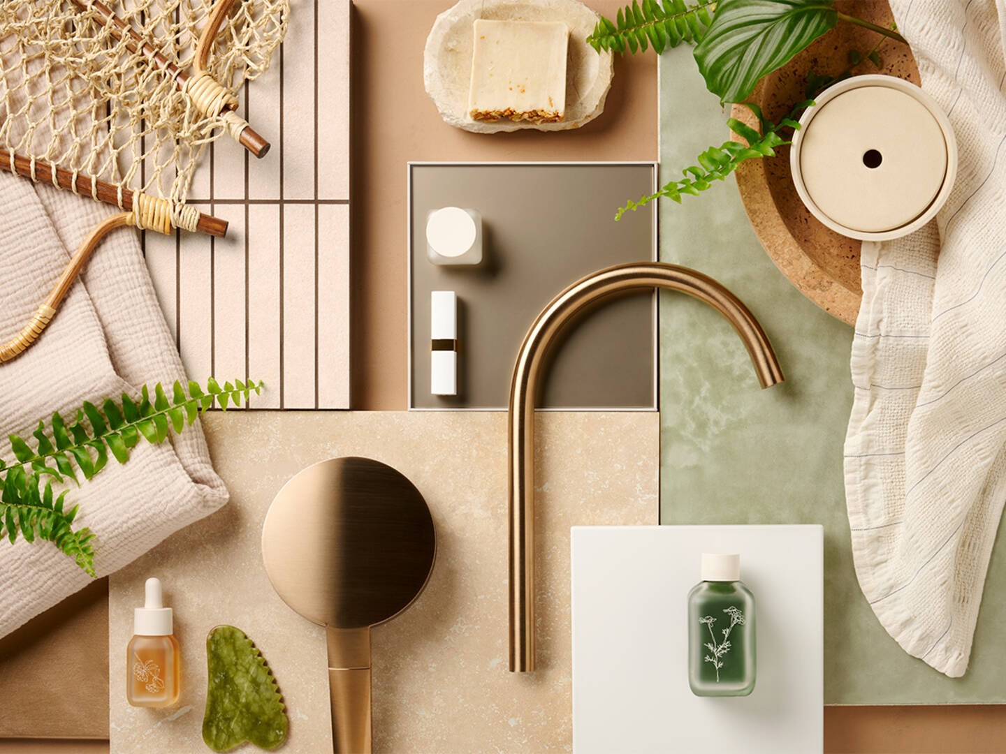 hansgrohe bathroom moodboard with brushed bronze fittings and natural materials