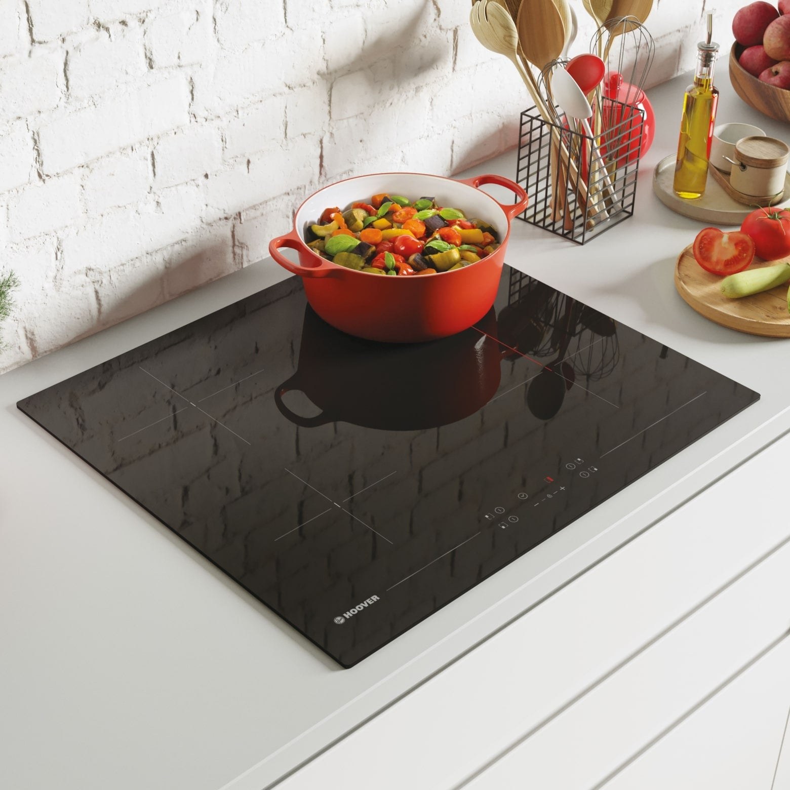 Hoover induction hob with a casserole dish on a white worktop