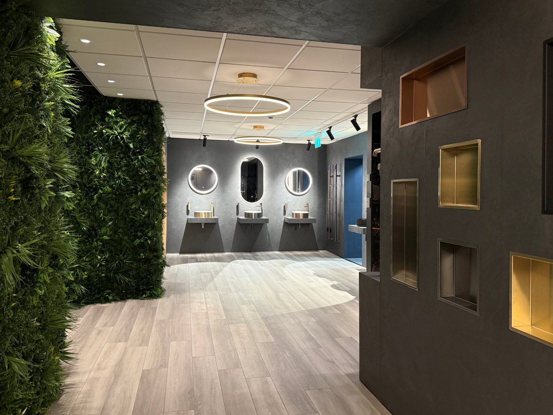 JTP showroom with displays of showers, mirrors and brassware
