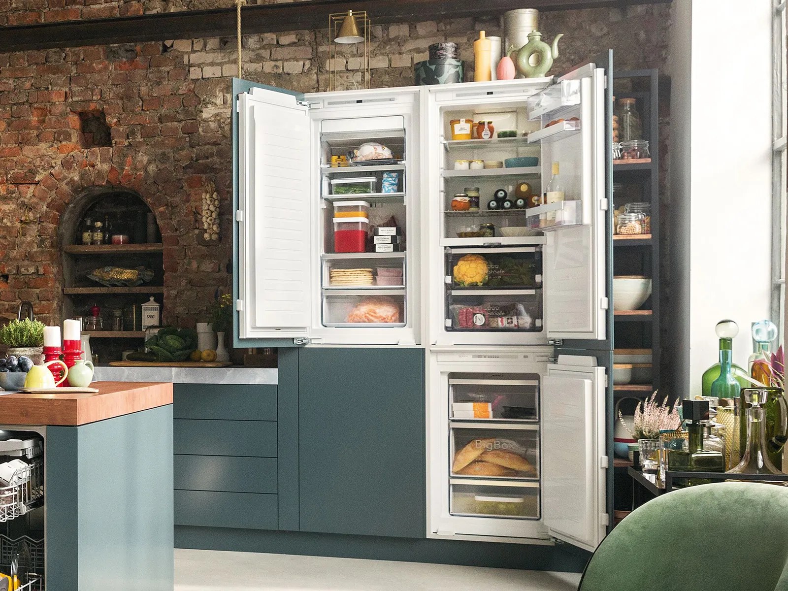 Neff fridge freezer in a green kitchen