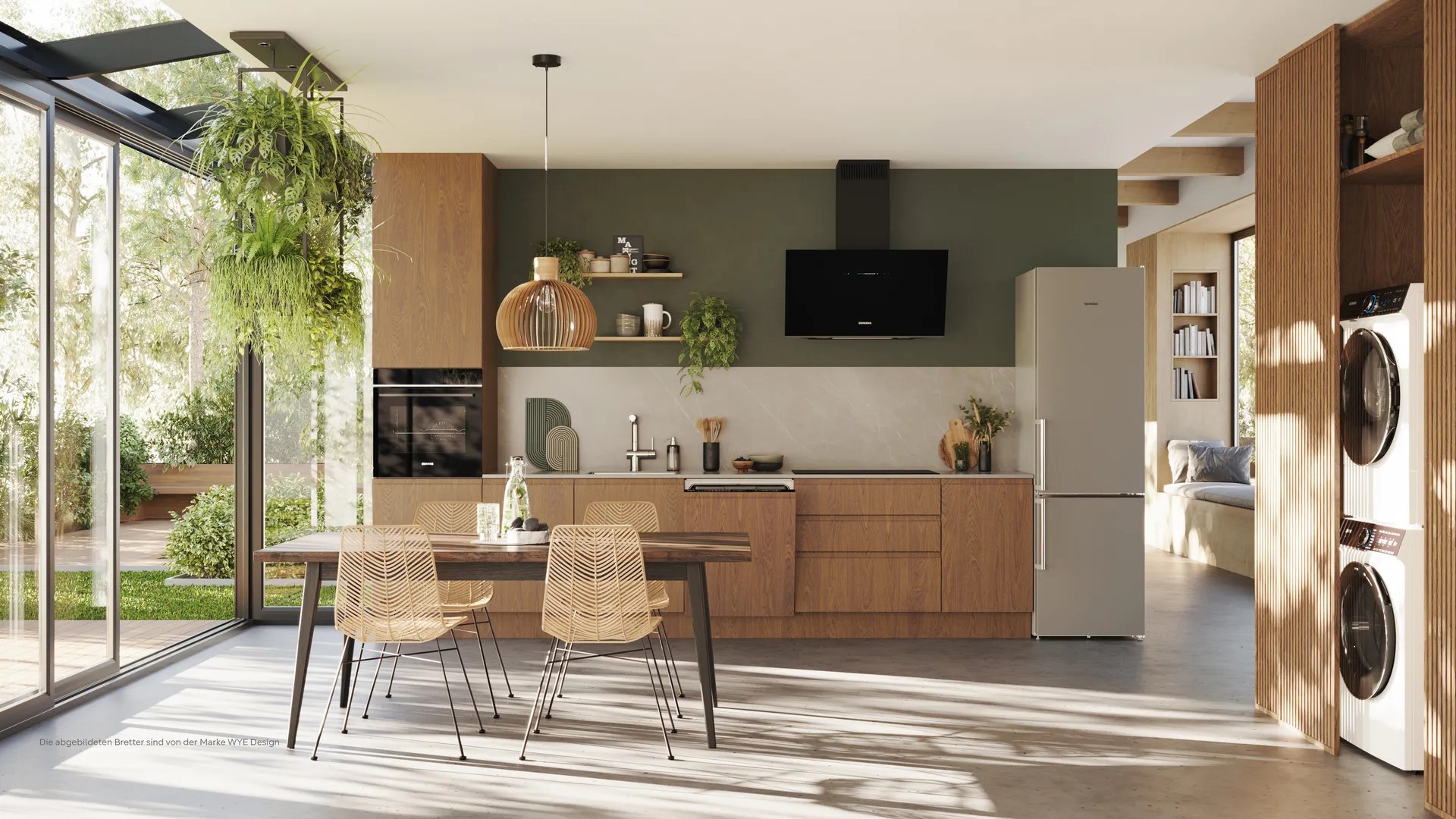 Open plan kitchen with Siemens appliances and a washer dryer tower